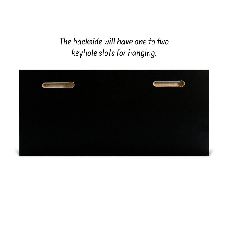 The image is a black rectangular object with two holes on the backside, which are designed to hold a keyhole slot for hanging.